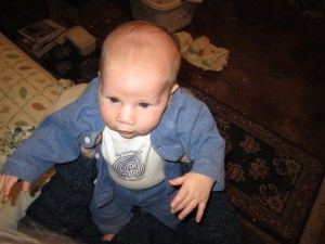 Modeling her little t-shirt.