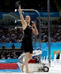 Missy Franklin wins the 200m Backstroke at the 2012 Olympics.  Sourced from: http://www.nydailynews.com/sports/london-olympics-2012-evolution-olympic-swimsuits-gallery-1.1130201?pmSlide=16