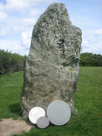 My frame drums by a standing stone on Anglesey 
