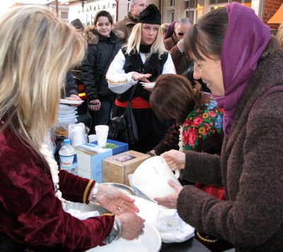 The author washing the midwife's hands in Kitros. 