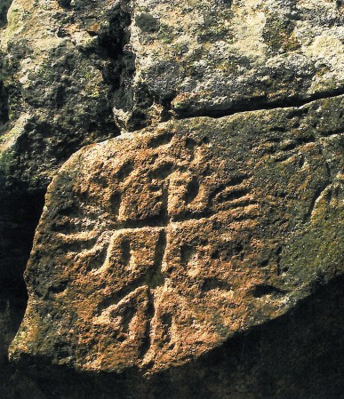 Neolithic Thracian rock carving depicting winged woman / Goddess figure. Photo: Rizes Ellinon.