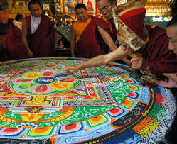Wiping off a sand mandala is a practice of letting go of identity: it can be beautiful and a lot of work has gone into it, but it's better to let it go