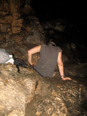 cave woman climbing