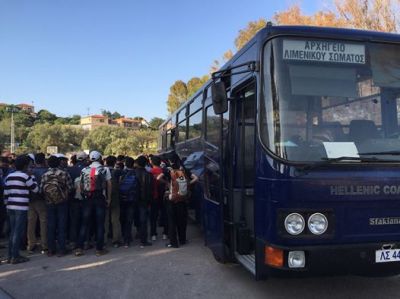 Refugees awaiting transport