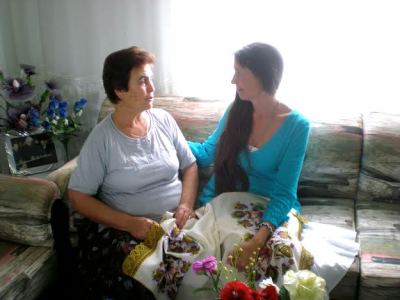  Laura and Magdalina, in northern Greece. In the course of my research, I have been welcomed in countless homes by Greek rural women. Many families may be materially poor by contemporary standards, but are rich in values of community, hospitality and sustainability. Here Magdalina is showing me samples of her peerless embroidery (featuring ancient Goddess motifs, for those who have eyes to see).