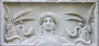 Temple relief of Demeter with grain, poppies, snakes, from Eleusis.