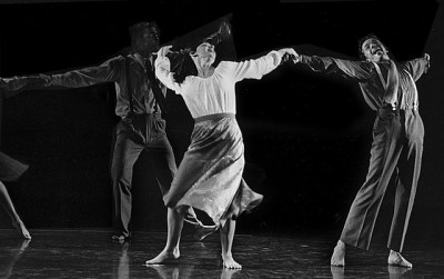 Joyful dancers move ecstatically