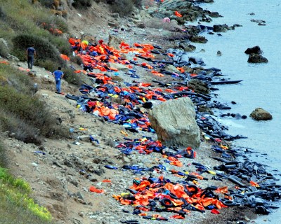 refugee-lifejackets-and-rubber-rafts