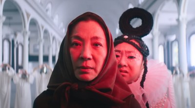 Jobu and Evalyn stare at the bagel. 